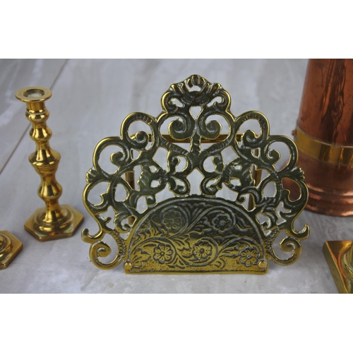 993 - A vintage brass letter holder, a pair of miniature brass candleholders and more.