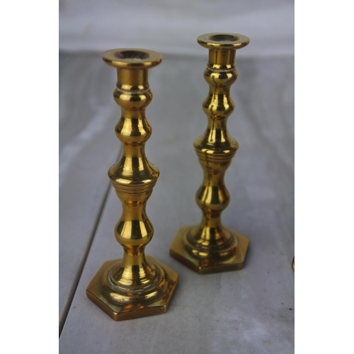 993 - A vintage brass letter holder, a pair of miniature brass candleholders and more.