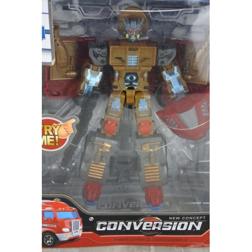 996 - A boxed Xinlexuan Toys conversion truck.