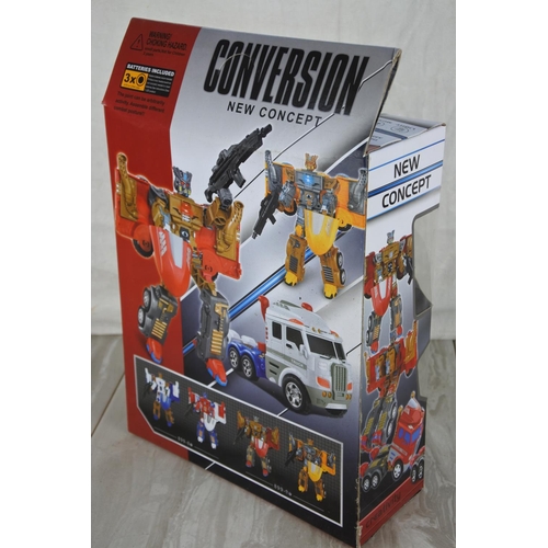 996 - A boxed Xinlexuan Toys conversion truck.