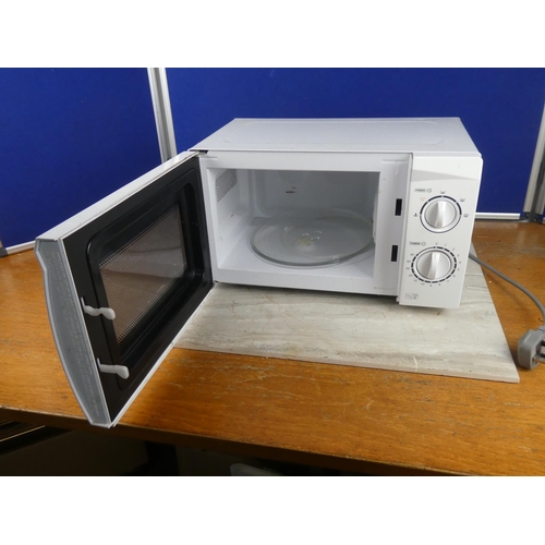 1054 - A small Daewoo microwave.