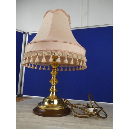 1063 - A brass based table lamp and shade. approx 50cm.