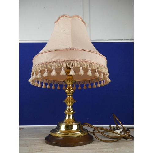 1063 - A brass based table lamp and shade. approx 50cm.