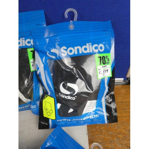 1094 - A lot of Sondico ankle guards.