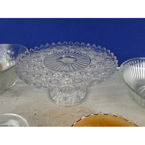 1103 - A vintage pressed glass cake plate and a lot of other crystal.