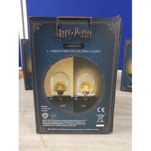 1107 - Four boxed Harry Pottery lights.