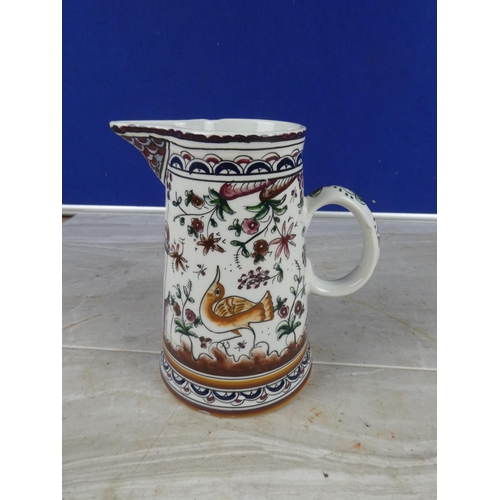 1108 - A hand painted pottery jug (a/f).