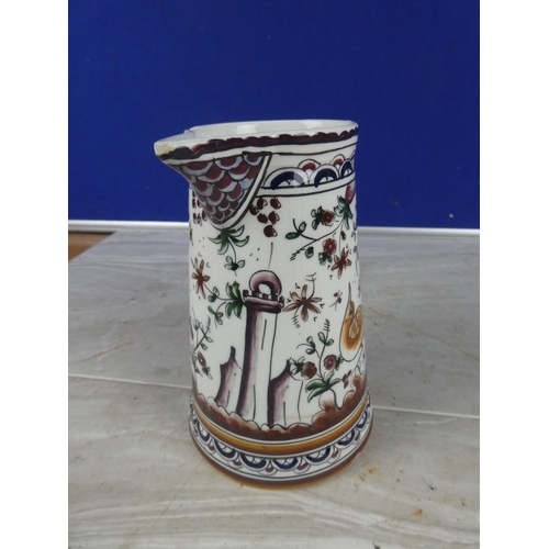 1108 - A hand painted pottery jug (a/f).