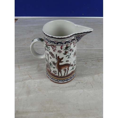 1108 - A hand painted pottery jug (a/f).