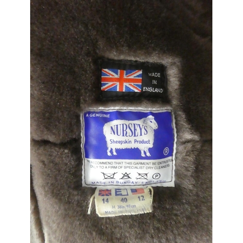 1117 - A vintage ladies sheepskin coat as new.