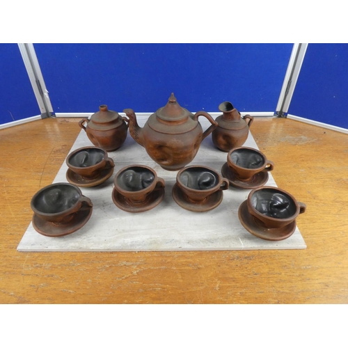 1136 - A vintage studio pottery tea set.