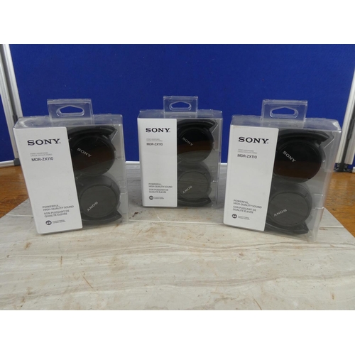 1143 - Three boxed Sony headphones.