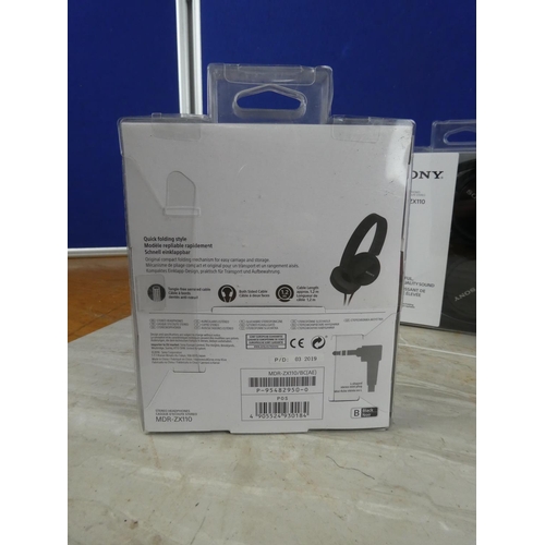 1143 - Three boxed Sony headphones.