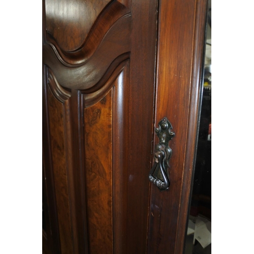 1152 - A stunning antique mahogany two door wardrobe with mirror doors. approx 215x150x48cm.