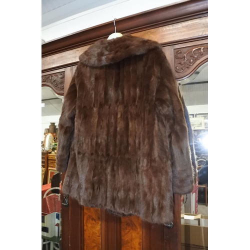 1153 - A vintage fur coat.