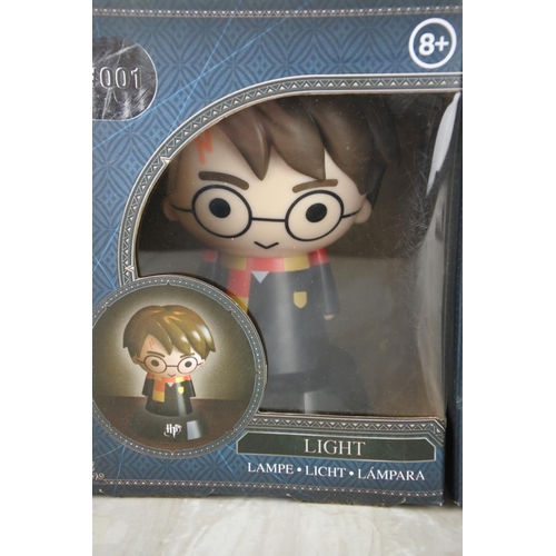 1162 - 2 boxed Harry Potter lights.