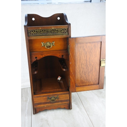 1178 - A stunning mahogany pipe storage cupboard with metal grill and two drawers. approx 50cm.