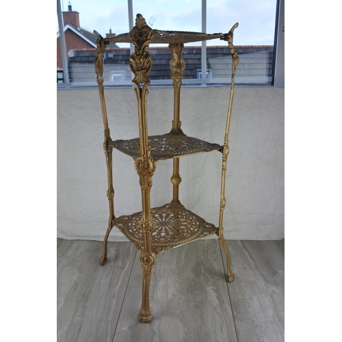 1180 - A three tier metal potstand. approx 72x26x26cm.