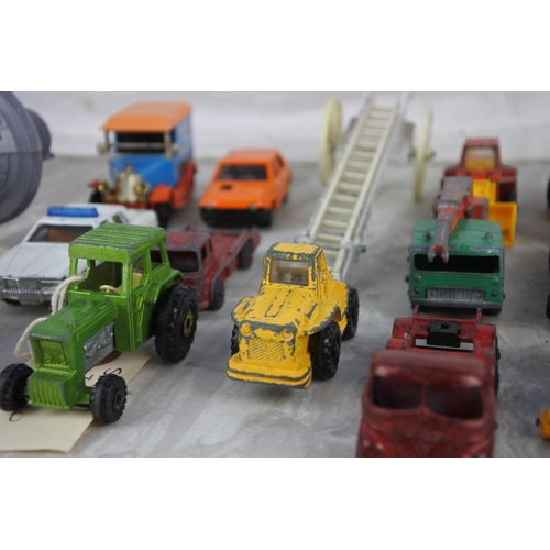 1199 - A lot of vintage, die-cast toy vehicles and more to include Matchbox tractors.