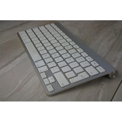 1200 - A boxed Apple wireless keyboard in original box.