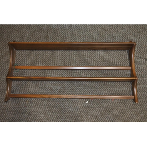 1215 - A vintage Ercol plate rack. approx50x97cm.