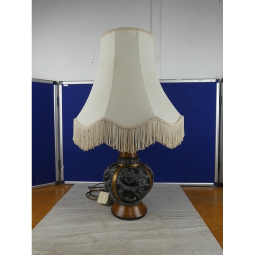 804 - A vintage pottery table lamp and shade. approx 67cm.