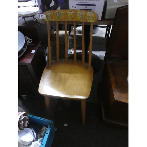 811 - A vintage pine chair.