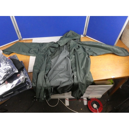 823 - A lot of waterproof jackets and trousers.