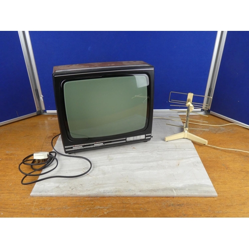 839 - A vintage ITT Featherlight Fifteen television and aerial. 15inch