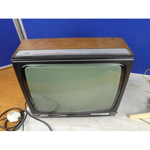 839 - A vintage ITT Featherlight Fifteen television and aerial. 15inch