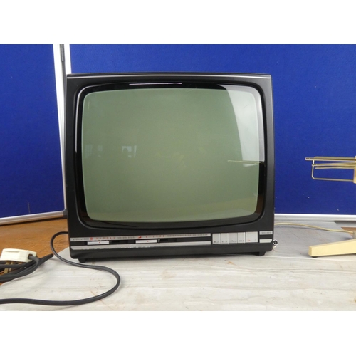 839 - A vintage ITT Featherlight Fifteen television and aerial. 15inch