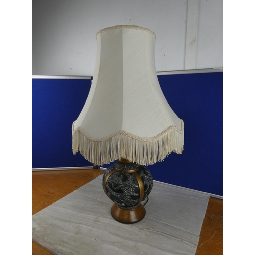 804 - A vintage pottery table lamp and shade. approx 67cm.