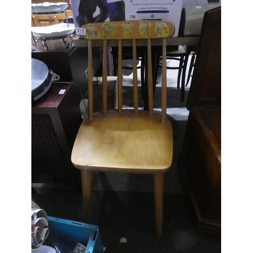 811 - A vintage pine chair.