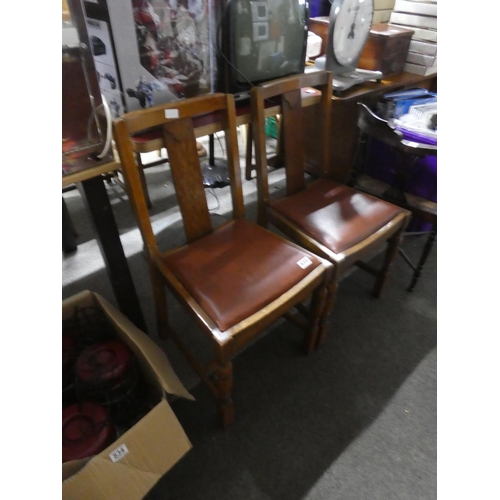 835 - A pair of vintage upholstered chairs.