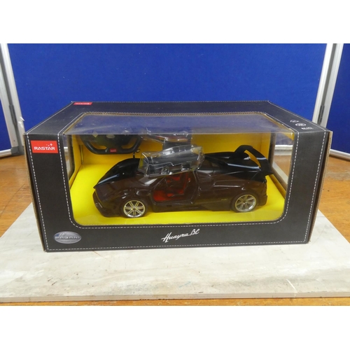 840 - A boxed Rastar Pagani remote controlled car.