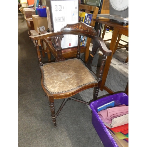 841 - An antique mahogany corner chair with inlay detail.