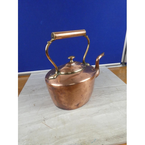 850 - A stunning antique copper kettle.