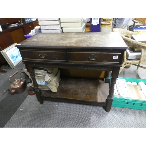 853 - An oak two drawer console table with undershelf. approx 81x94x44cm.