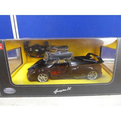 854 - A boxed Rastar Pagani remote controlled car.