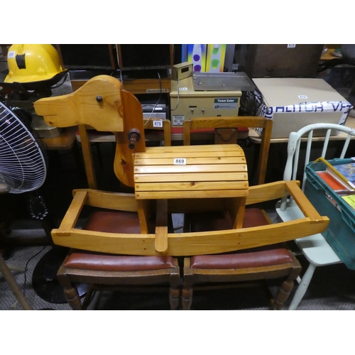 869 - A child's wooden rocking horse. approx 97x62cm.