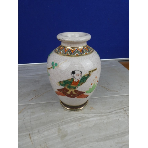 894 - An oriental style vase with hand painted detail.