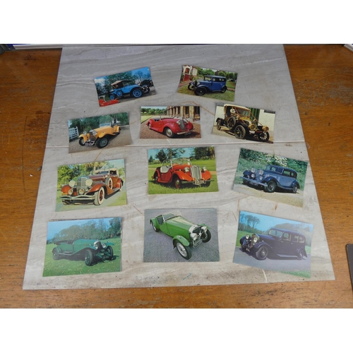 904 - A collection of vintage postcards of cars to include Bamforth, Dennis Production and more.