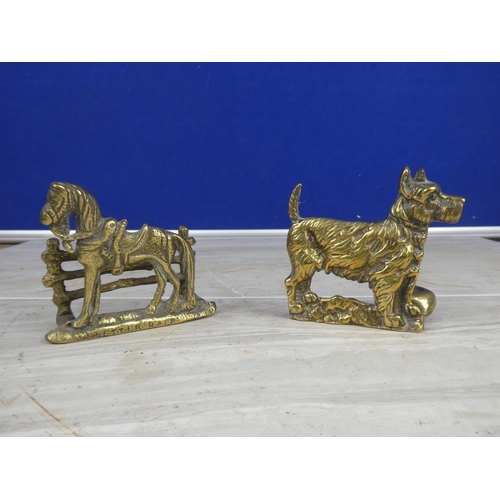 907 - A vintage brass dog ornament of a dog and bowl and another.