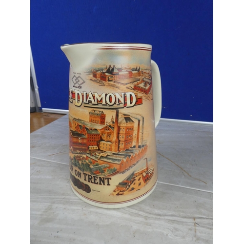 914 - A 'Double Diamond - Burton on Trent' pottery jug.