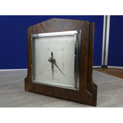 916 - A vintage oak cased barometer.