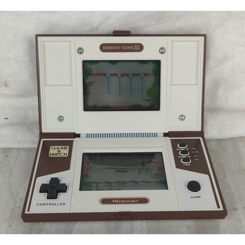 346 - A 1983 Game and Watch Nintendo Donkey Kong II multi-screen handheld games console.