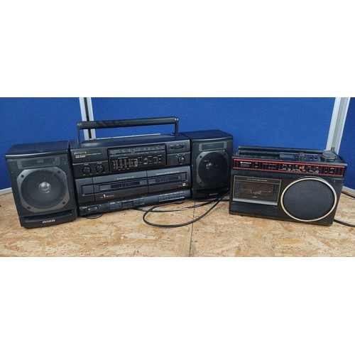 1375 - An Aiwa Ca-W37 Stereo radio cassette carrying component system and a Hitachi high quality sound syst... 