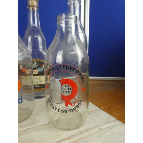 1221 - A collection of vintage milk bottles and more.