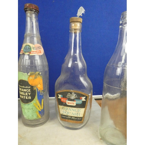 1221 - A collection of vintage milk bottles and more.