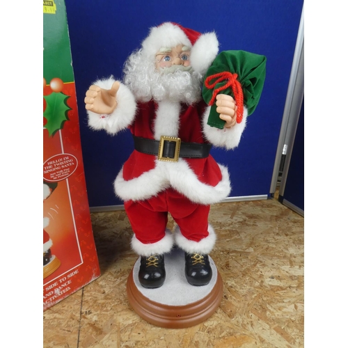 1230 - A boxed musical Santa.